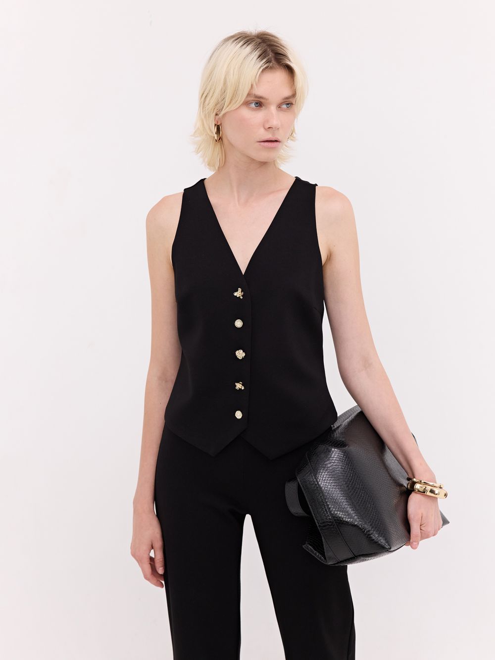 ווסט כפתורים