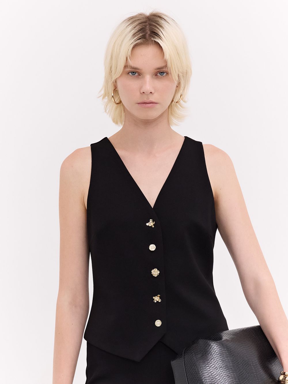 ווסט כפתורים