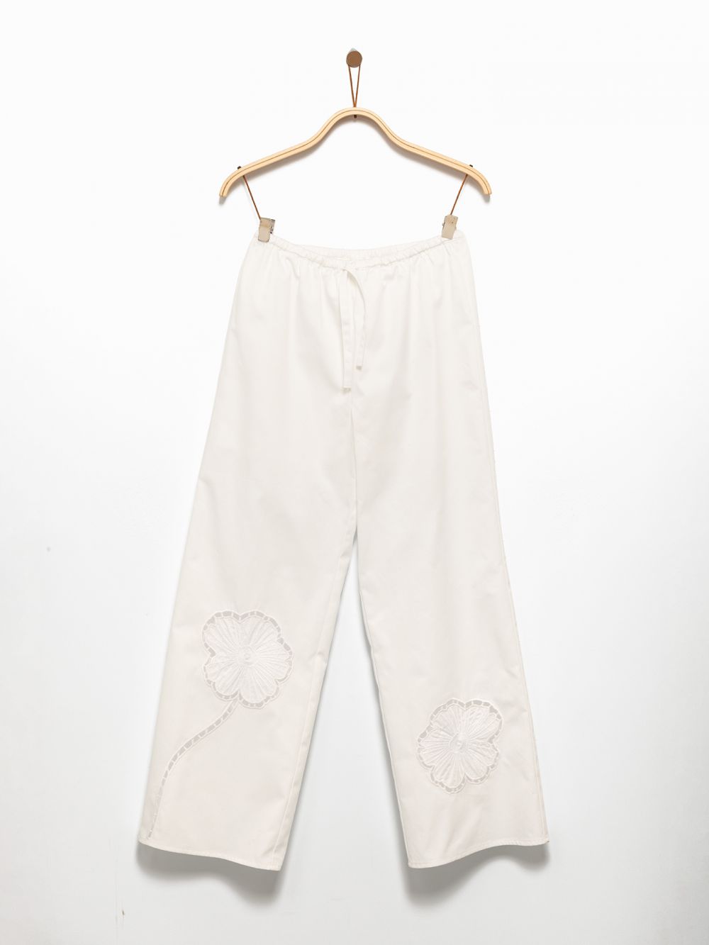 מכנסי אריג רקומים