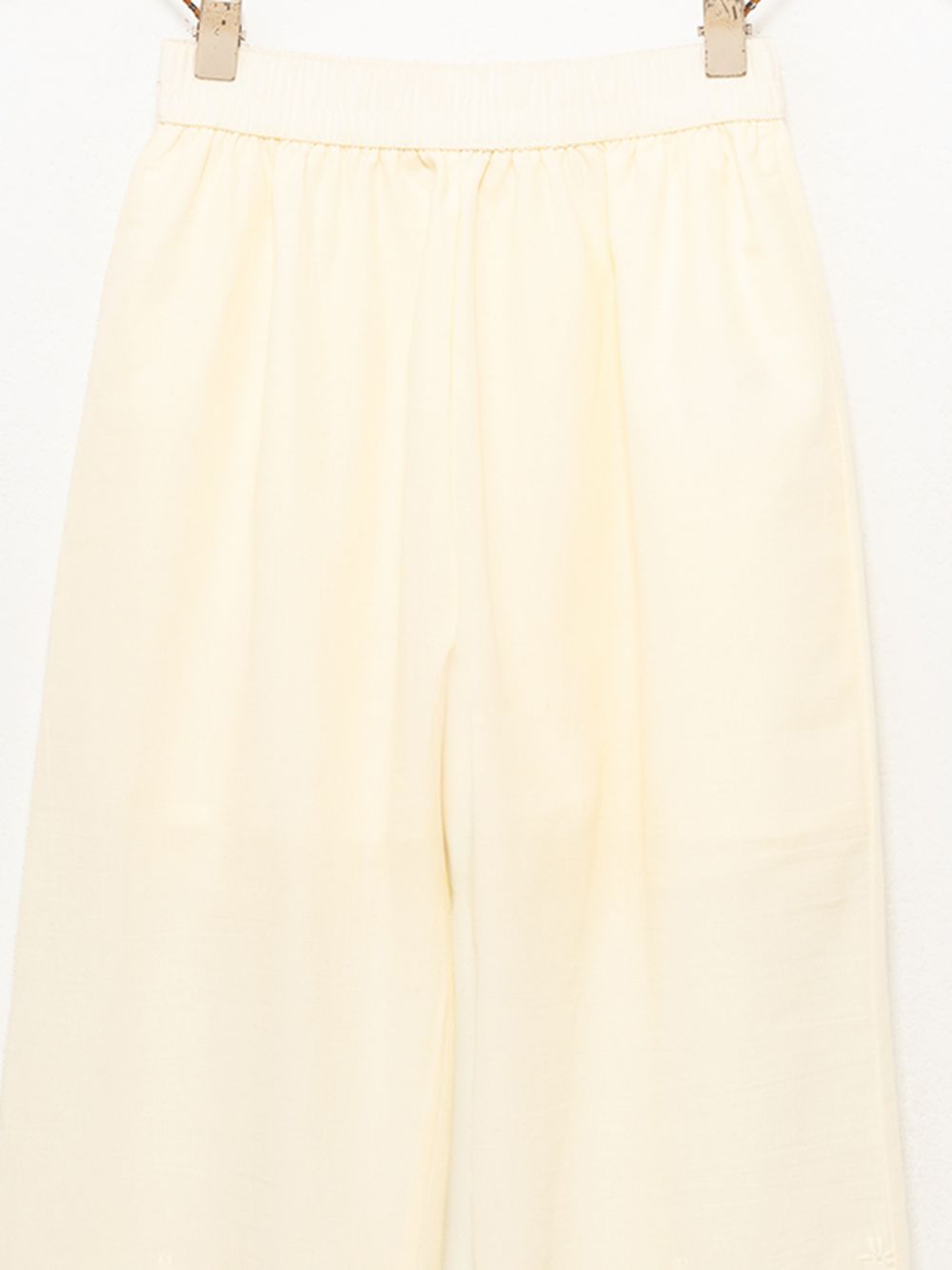 מכנסי אריג רקומים