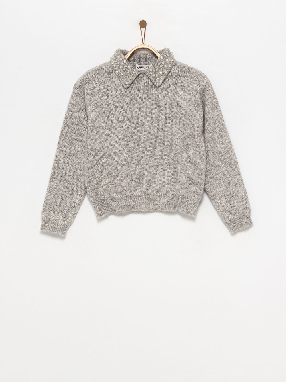 סריג פולו עם חרוזים