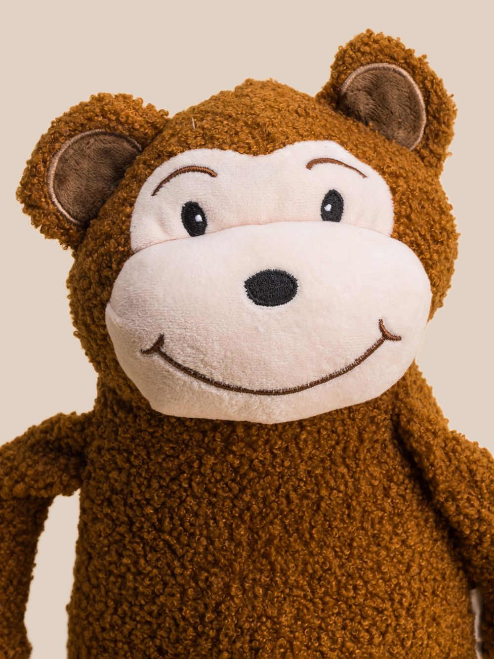 בובת קוף פרוותית 16X23X14CM