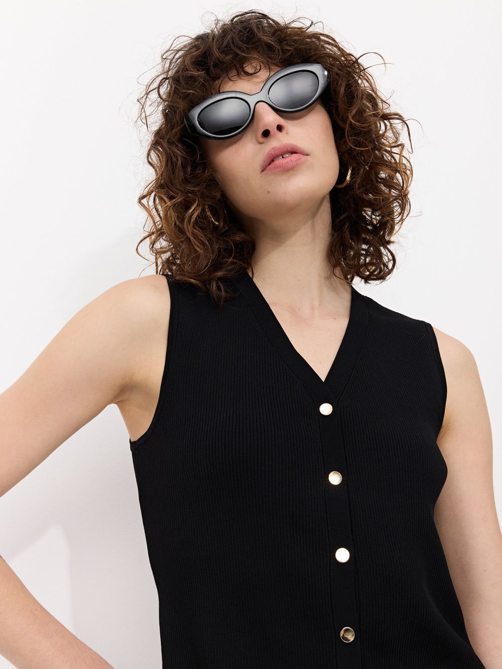 סריג ריב עם תיקתקים בצבע זהב