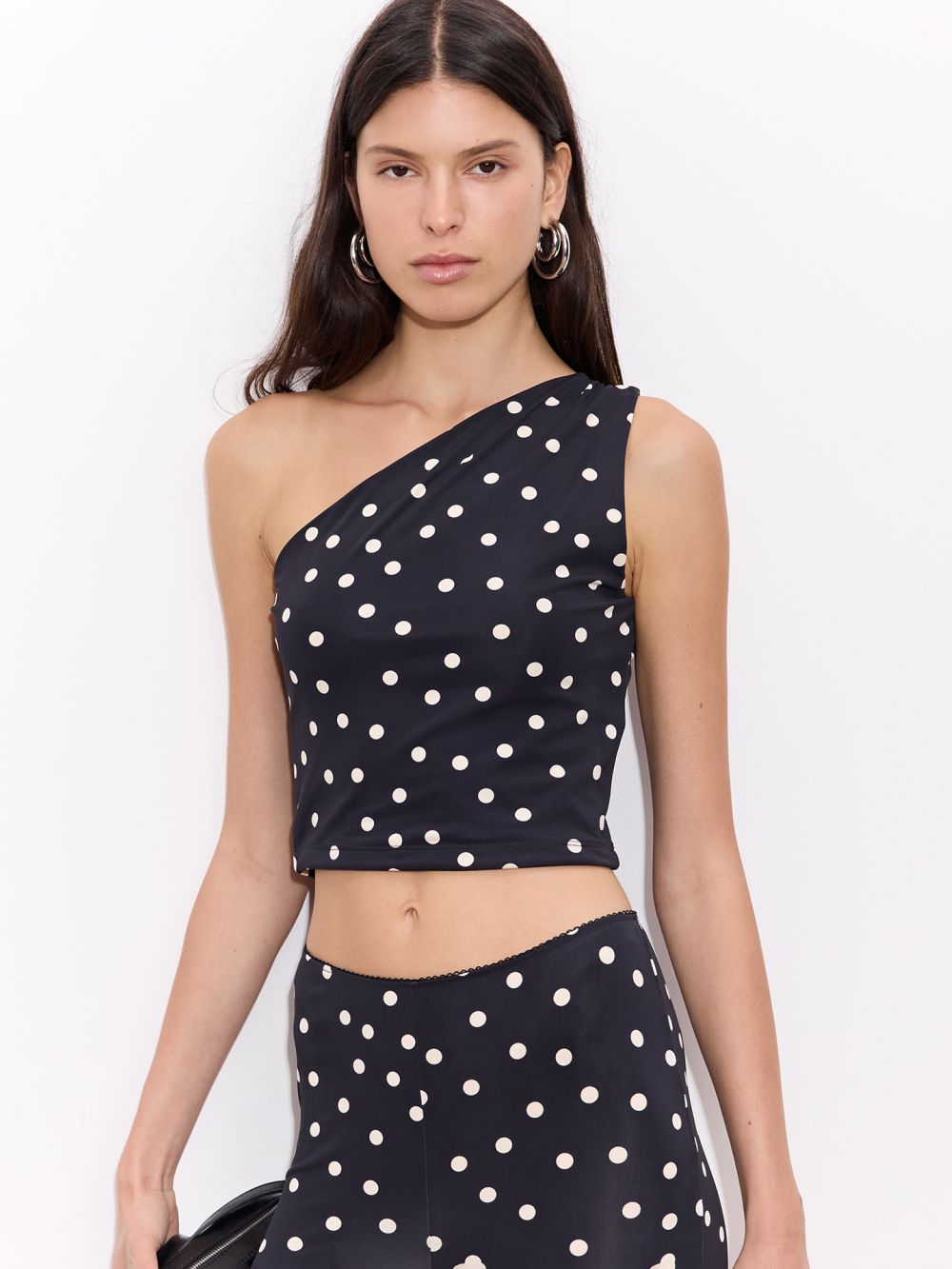 טופ אסימטרי מנוקד