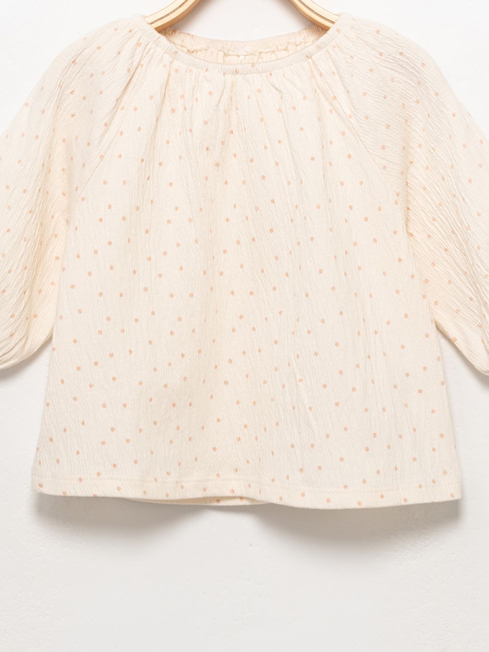 חולצה עם כיווצים