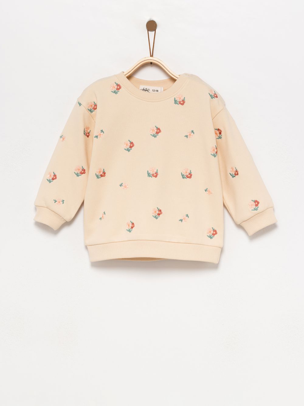 סווטשירט עם רקמת פרחים