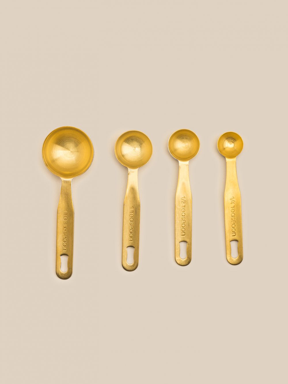 סט 4 כפות מדידה זהב