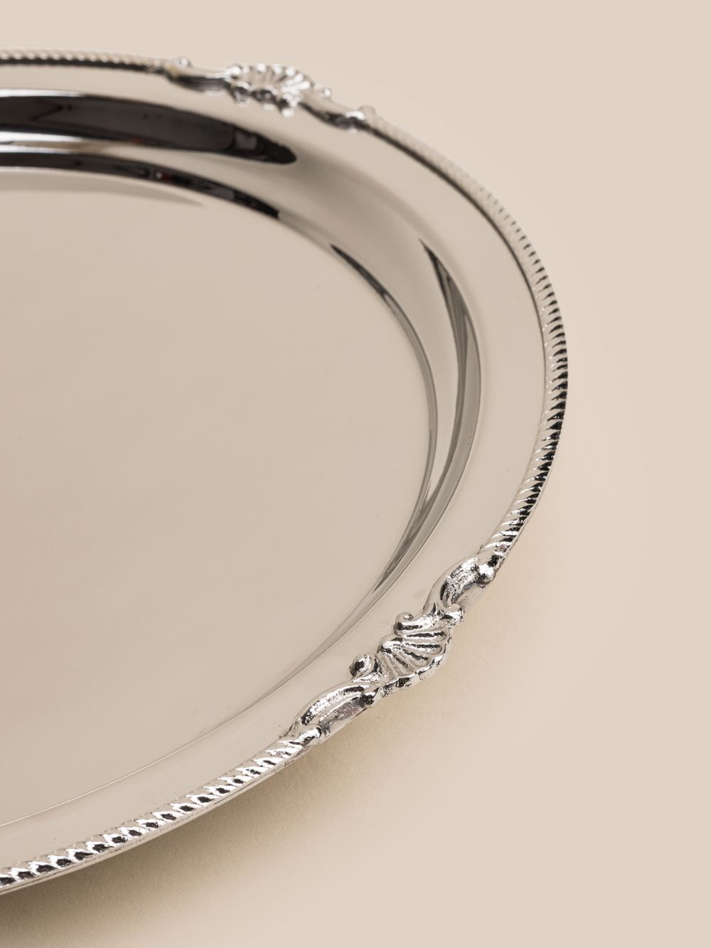 מגש נירוסטה מעוטר עגול 34CM