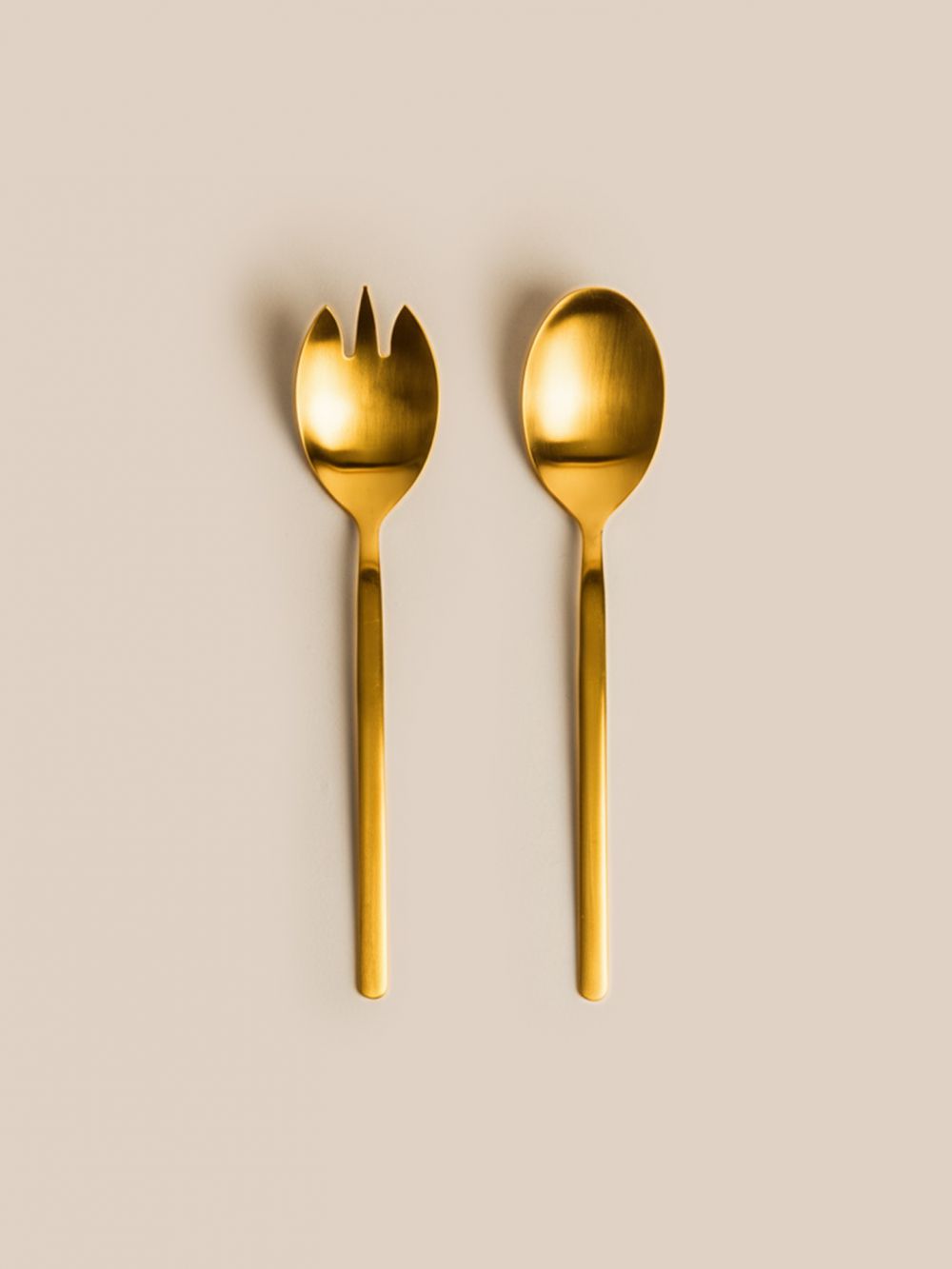 כפות הגשה מוזהבות דניאל