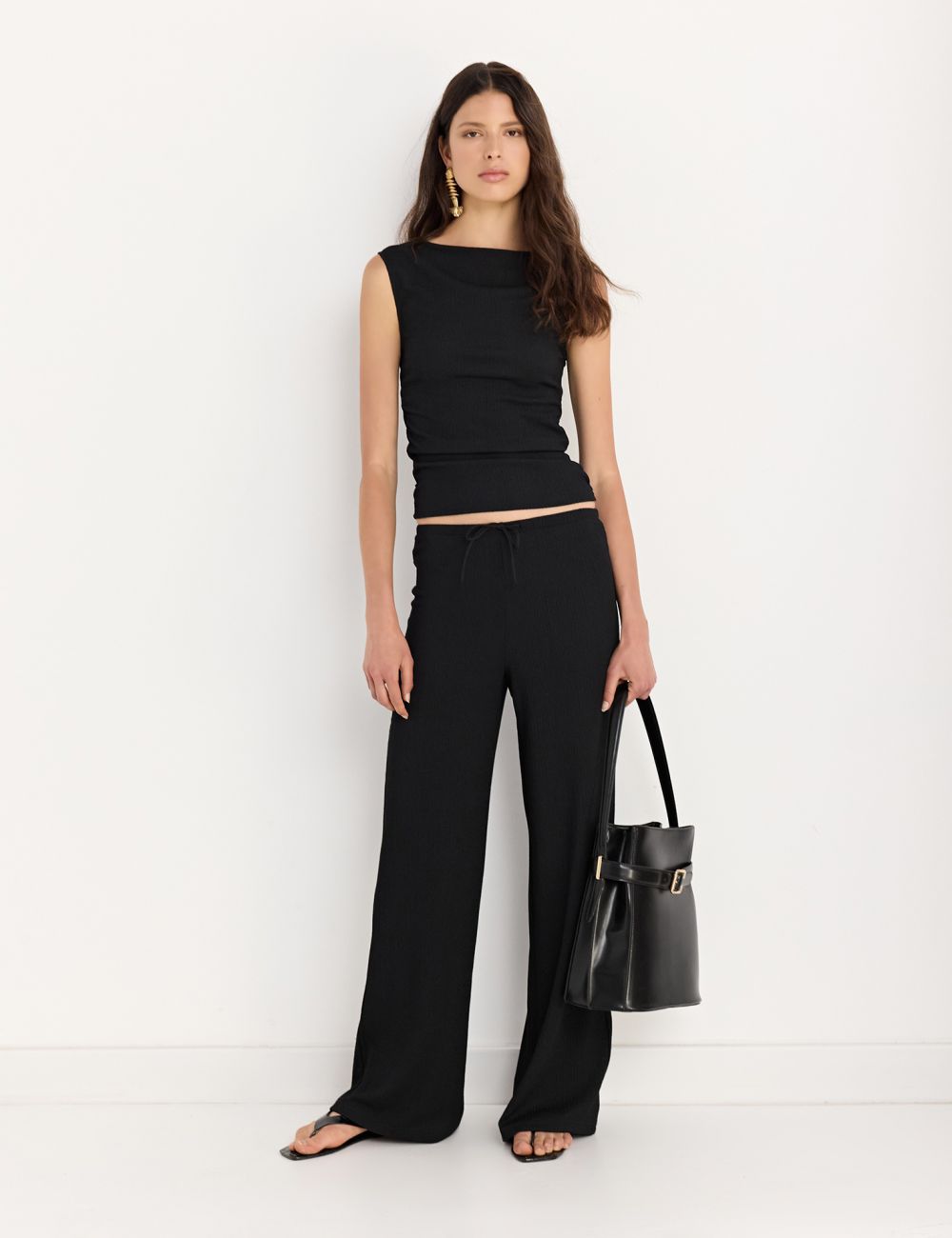 מכנסיים מבד טקסטורה