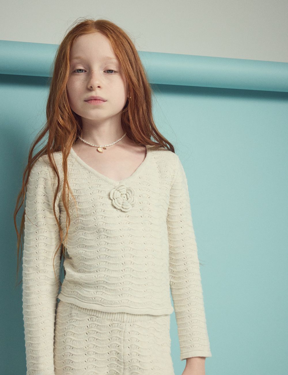 סריג ארוך עם פרח