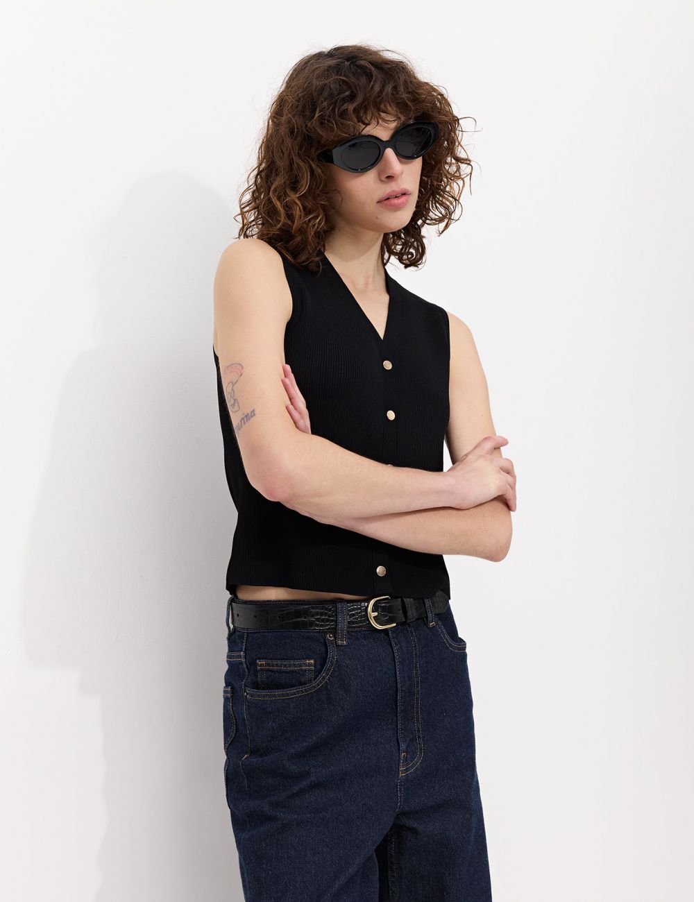 סריג ריב עם תיקתקים בצבע זהב