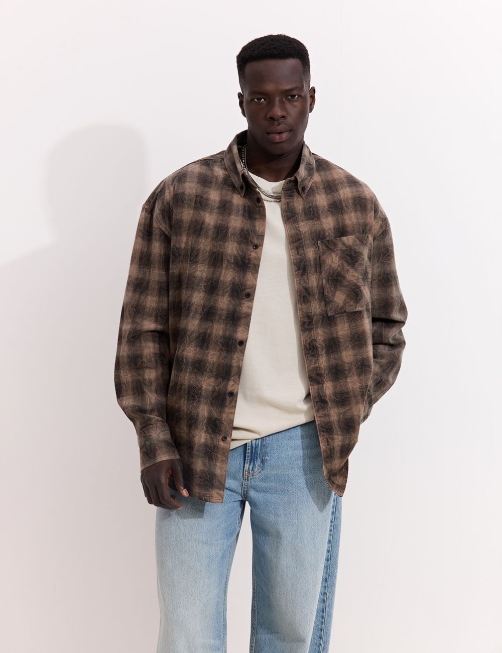 מכופתרת משבצות ארוכה