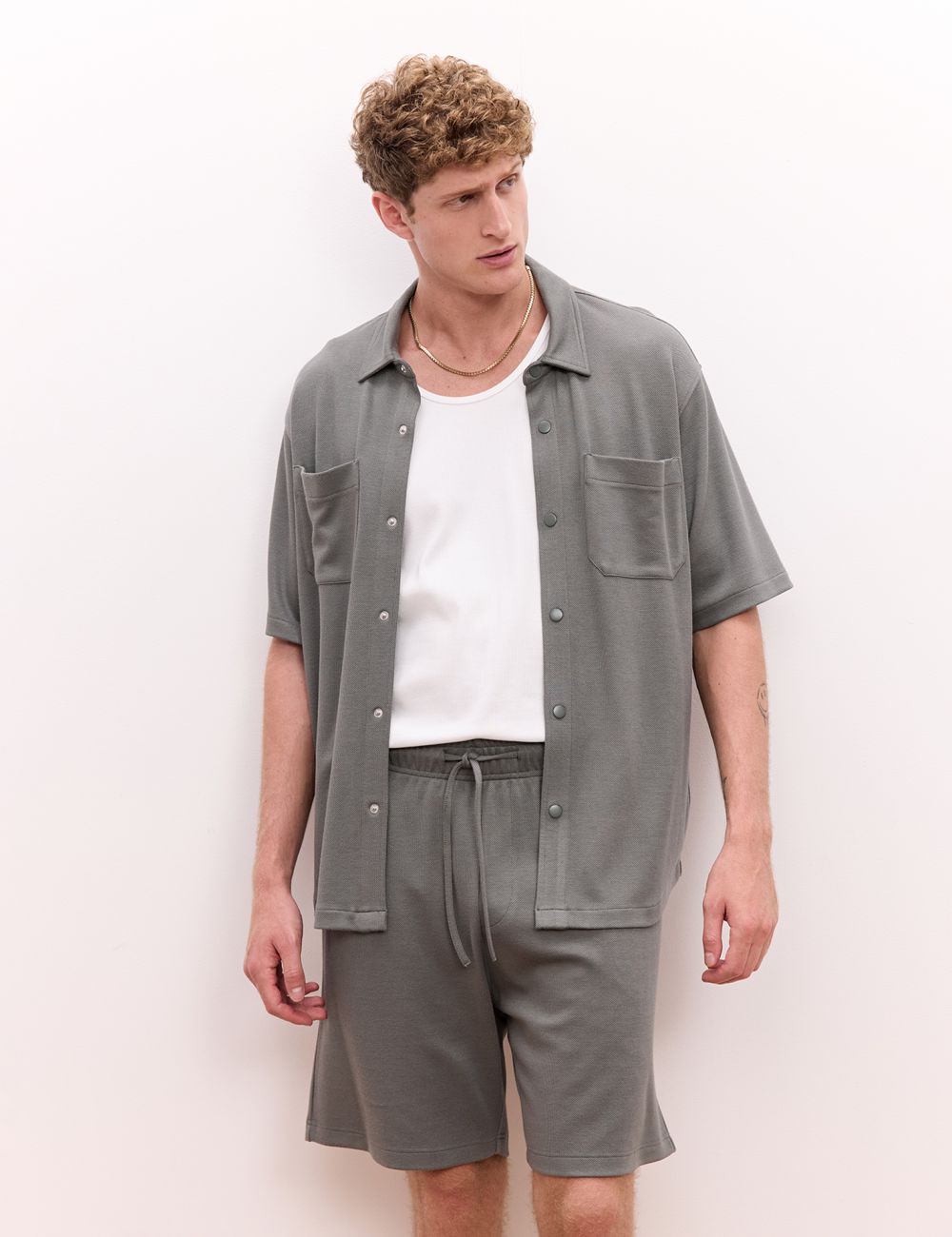 חולצה מכופתרת מבד סריג