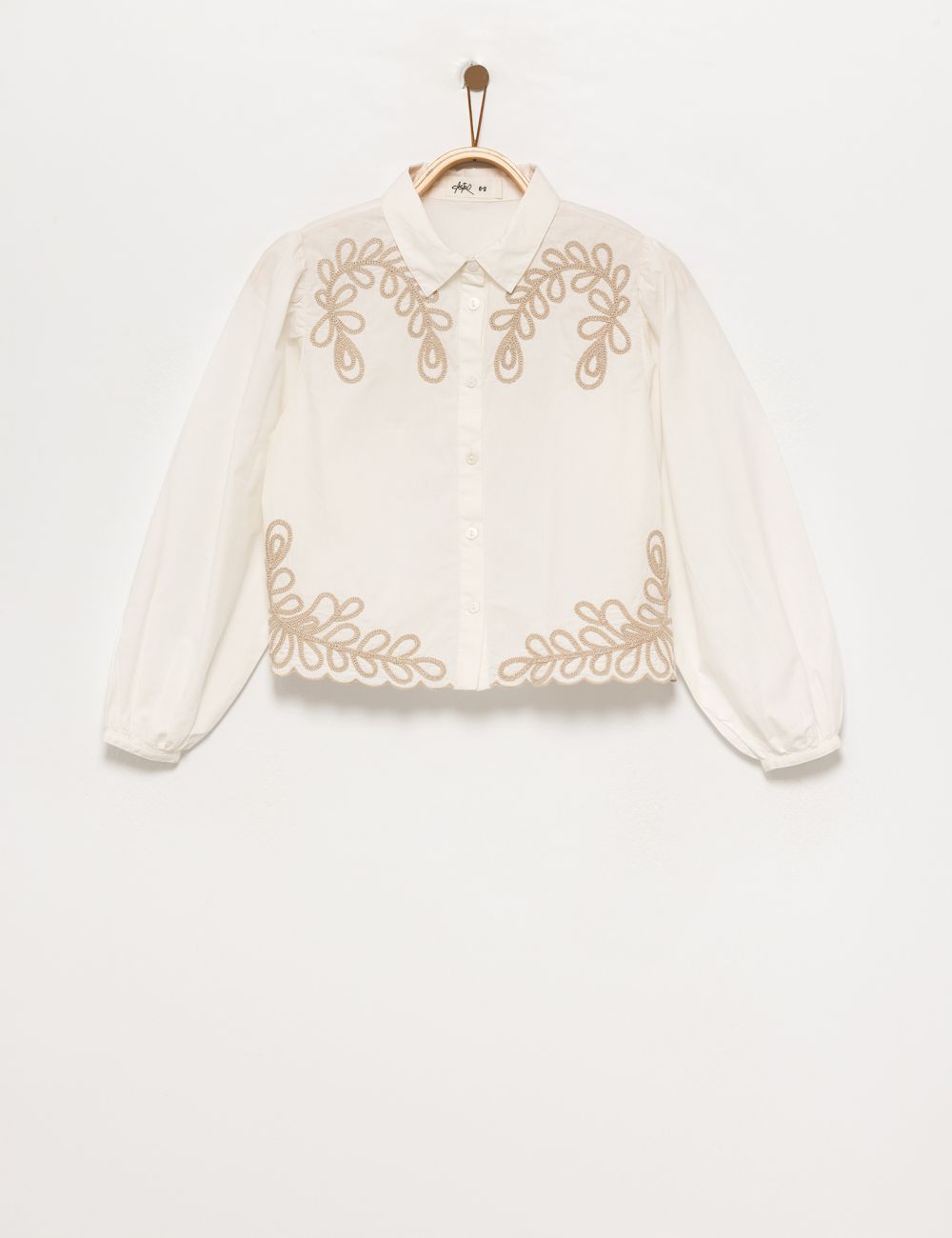 חולצת אריג מעוטרת