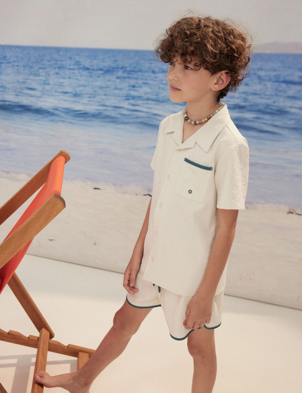 מכופתרת בגד ים